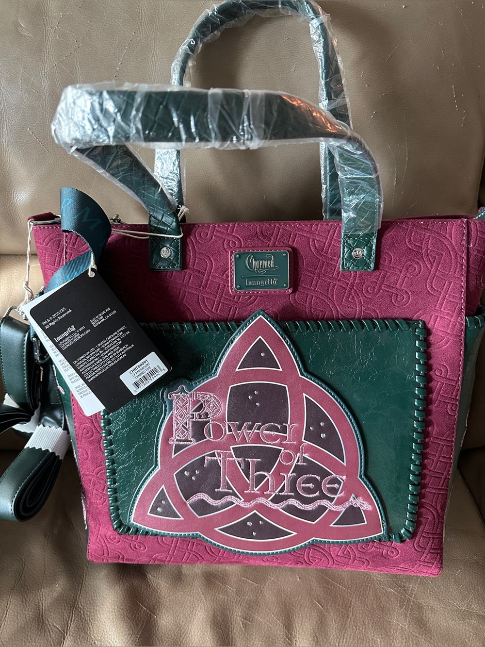 Lounge Fly Charmed tote/converts into a backpack!  Brand new with tags.